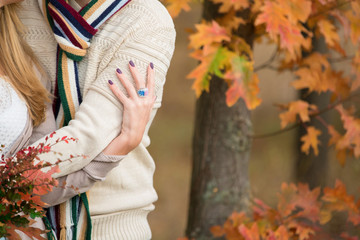 Autumn wedding in boho style. Autumn leaf fall, autumnal forest. loving couple, man and woman. orange pumpkin