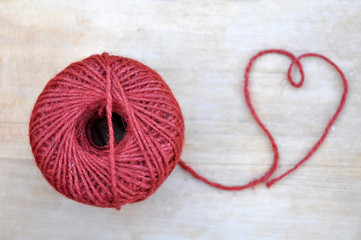 Red Rope Skein On Wood Table
