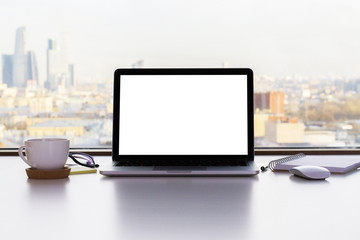 Blank white laptop screen