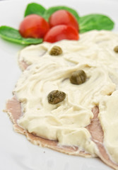 Slices of veal with tuna sauce and capers