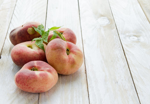 Saturn peaches or UFO, donut, flat peaches 