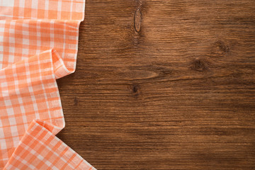 Tablecloth textile on wooden background 
