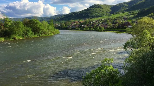 Dunajec river (Tylmanowa Village) spring windy sunny day.