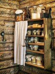 Shelf with food reserves on the Estonian old farm.