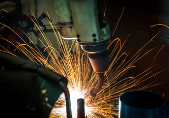 Welding robots movement in a car factory