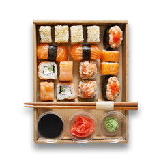 Set of sushi maki and rolls at box isolated. © Prostock-studio
