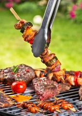 Abwaschbare Fototapete Meat skewer on grill © Jag_cz