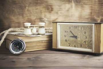 clock,compass and telescope