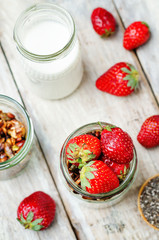Chia seeds granola Greek yoghurt pudding with strawberries