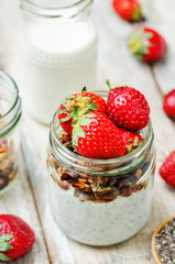Chia seeds granola Greek yoghurt pudding with strawberries