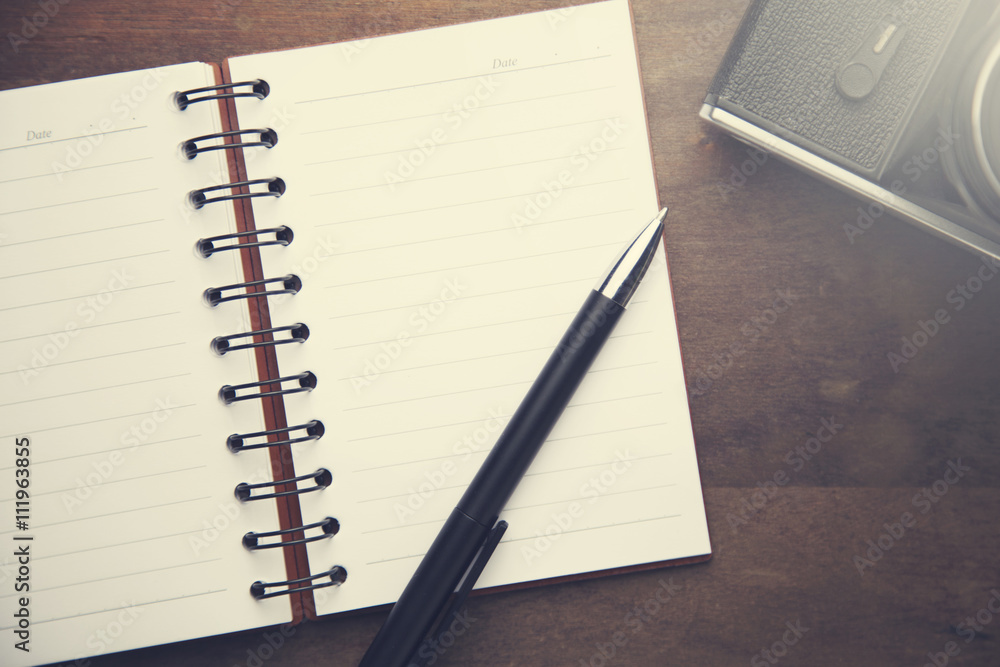 Poster notebook with pen and camera