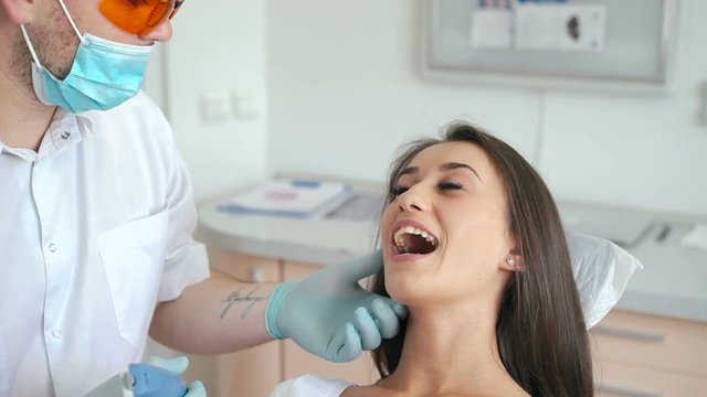 Using dental UV light equipment for polymer hardening in dental room