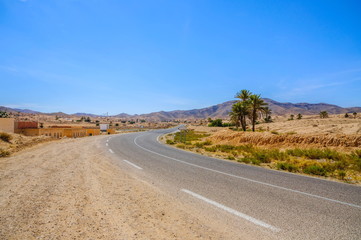 Fototapeta na wymiar Road in Sahara desert, Tunisia, Africa