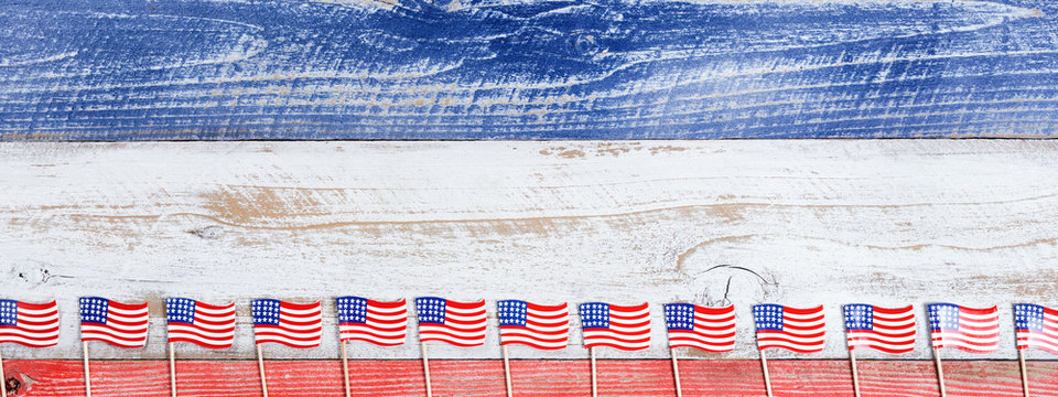 Small USA flags on bottom of rustic boards with national colors