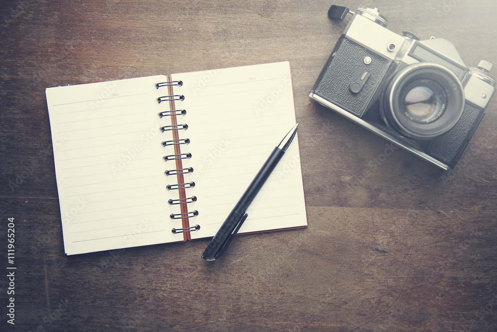 Poster notebook with pen and camera