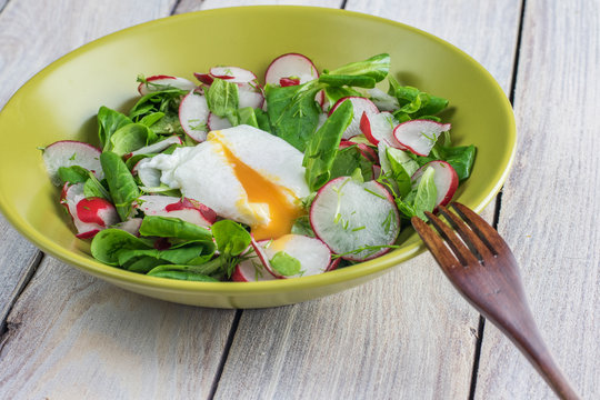 Radish Salad with Poached Egg with Wooden Fork