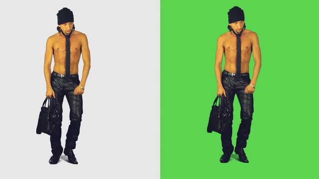 half-dressed sexy man with the bag . The white background to evaluate the picture, green for ease of separation of the object from the background.