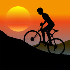 cycle races in mountains silhouette at sunset a sun