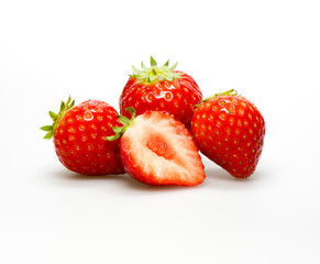 Ripe strawberries on white background