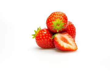 Ripe strawberries on white background