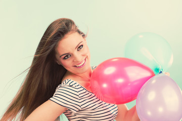 Woman summer joyful girl with colorful balloons