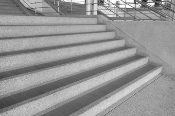 stairs and railing of a modern building, monochrome