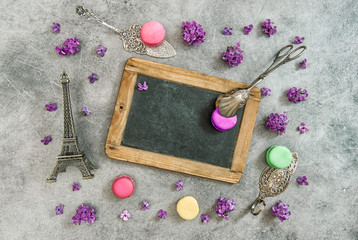 Fototapeta na wymiar Vintage chalkboard, macaroon cookies, Eiffel tower Paris