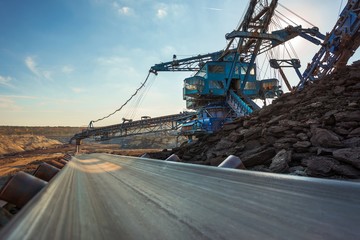 Long conveyor belt transporting ore