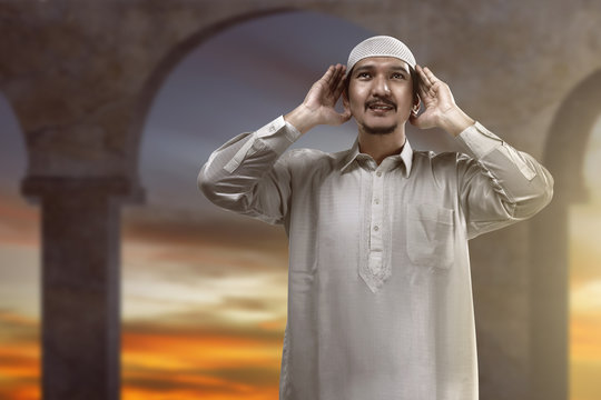 Muslim man doing adzan