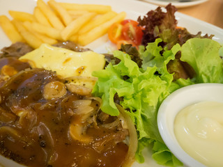 Grilled beef steak with cheese