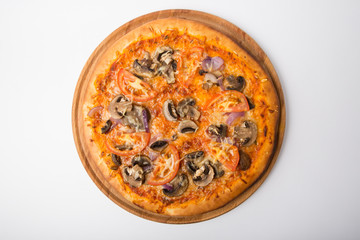 Whole pizza on white background