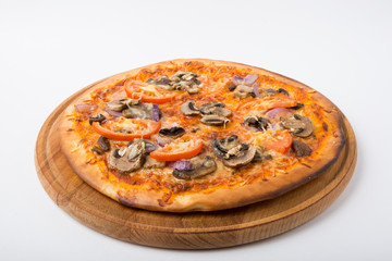 Whole pizza on white background