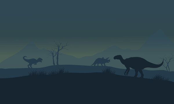 Silhouette of Iguanodon in fields
