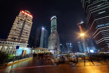 Tuinposter Modern view of skyscrapers on Century Avenue at night, Shanghai © efired
