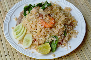 fried rice mixed seafood and pork on plate