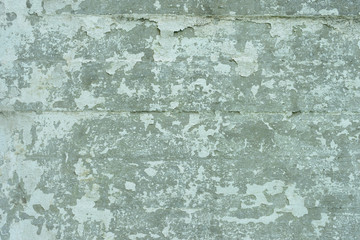 Wall fragment with attritions and cracks