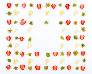Frame with slices of strawberries and slices of lemon