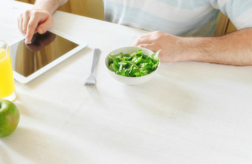Man eating salad