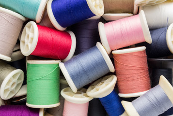colorful spools of thread background