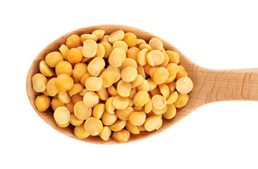 Wooden spoon with peas isolated on white background.