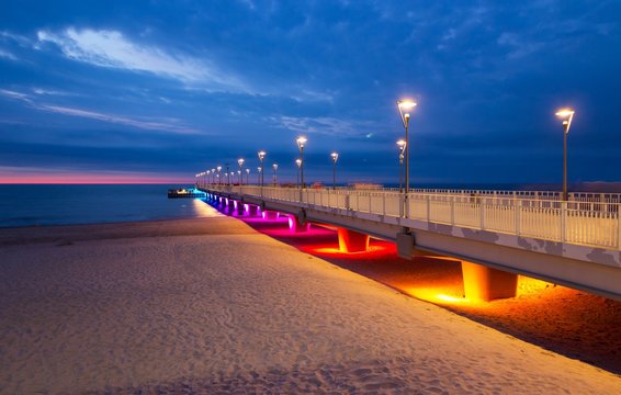 Colorful lights on the pier in the evening, Kolobrzeg, Poland