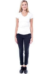 Obraz premium young woman standing on white background.