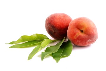 Peach. Peaches isolated on white background. Peach with green leaves.