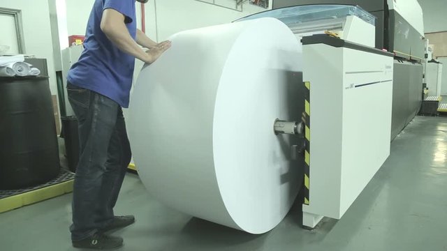 Loading paper into industrial inkjet printer
