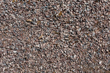 a surface of small stones and gravel 23