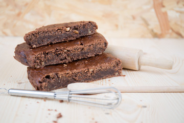 Tasty Stack of three pieces of chocolate brownie cake