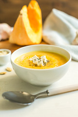 pumpkin soup with cheese and herbs