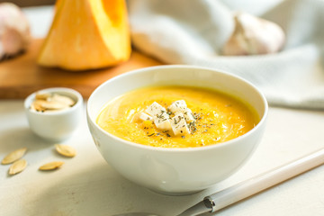 pumpkin soup with cheese and herbs