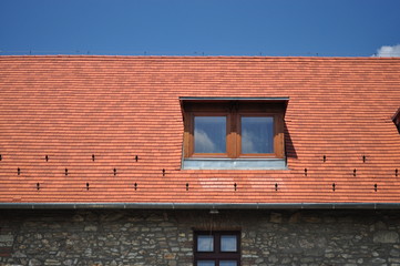 Window on the tile with blue sky background