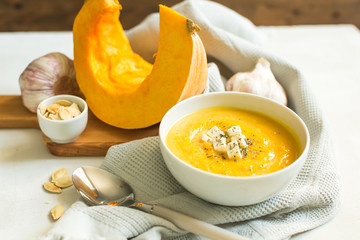 pumpkin soup with cheese and herbs